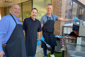 three ocdsb staff members grilling food at the Fall Barbeque lunch