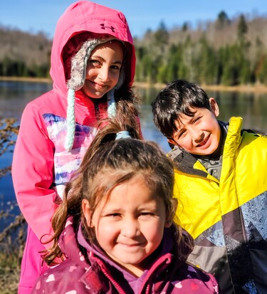 three young ocdsb students who are new arrivals to Canada